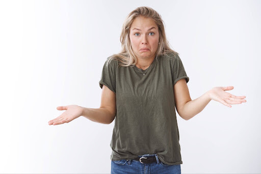 confused unsure woman hands up in indifference